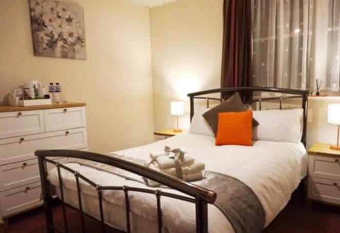 ביגלסווייד Stratton Cottage Guesthouse מראה חיצוני תמונה A bedroom at the hotel